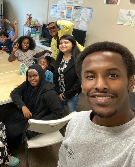 Living Well Kent program coordinators take a selfie with youth in the program