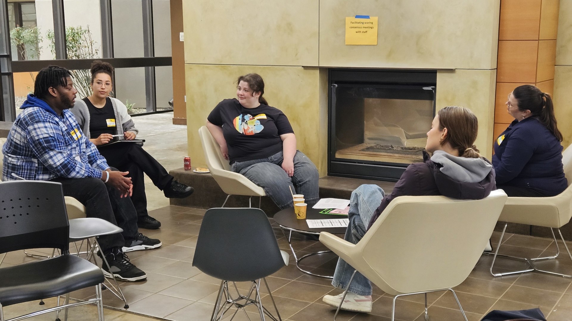 A group of providers have a discussion in a small group